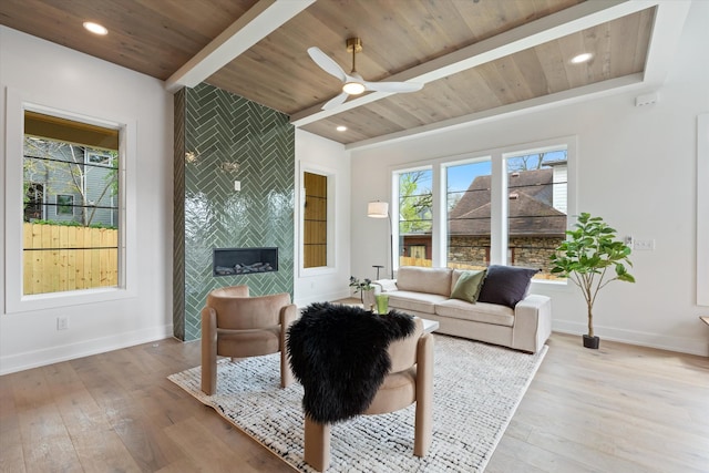 2510 Vaulx Ln, Nashville, TN 37204 - living room featuring light wood-style flooring, baseboards, and wood ceiling