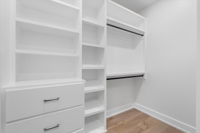2510 Vaulx Ln, Nashville, TN 37204 - walk in closet featuring wood finished floors