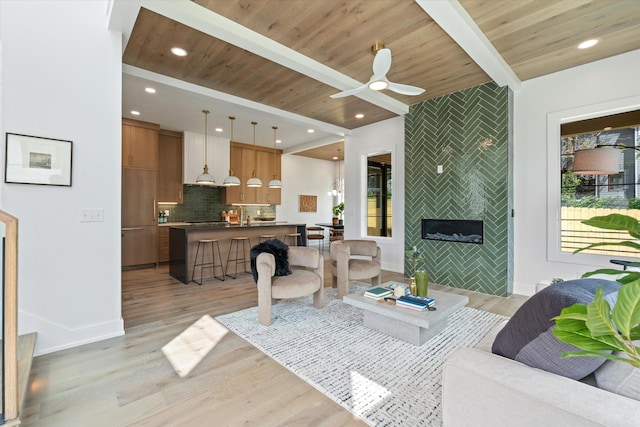 2510 Vaulx Ln, Nashville, TN 37204 - living room featuring light wood-type flooring, wooden ceiling, ceiling fan, and beam ceiling