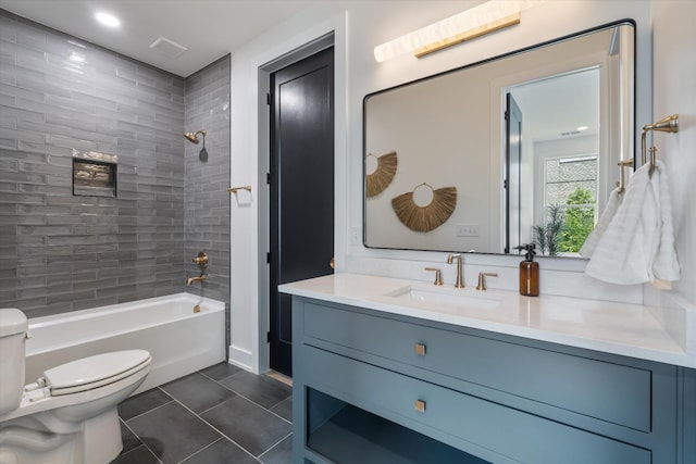 2510 Vaulx Ln, Nashville, TN 37204 - bathroom with washtub / shower combination, tile patterned floors, vanity, and toilet