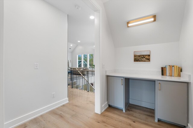 2510 Vaulx Ln, Nashville, TN 37204 - unfurnished office featuring baseboards, built in desk, recessed lighting, vaulted ceiling, and light wood-style flooring