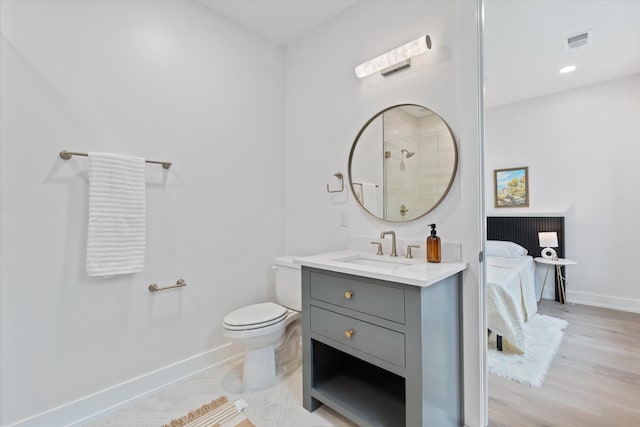 2510 Vaulx Ln, Nashville, TN 37204 - ensuite bathroom with vanity, baseboards, toilet, visible vents, and a tile shower