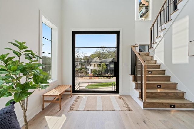 2510 Vaulx Ln, Nashville, TN 37204 - entryway with baseboards, stairway, and wood finished floors