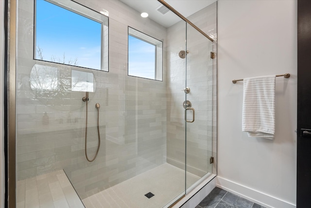 2510 Vaulx Ln, Nashville, TN 37204 - bathroom featuring a shower stall, tile patterned floors, and baseboards