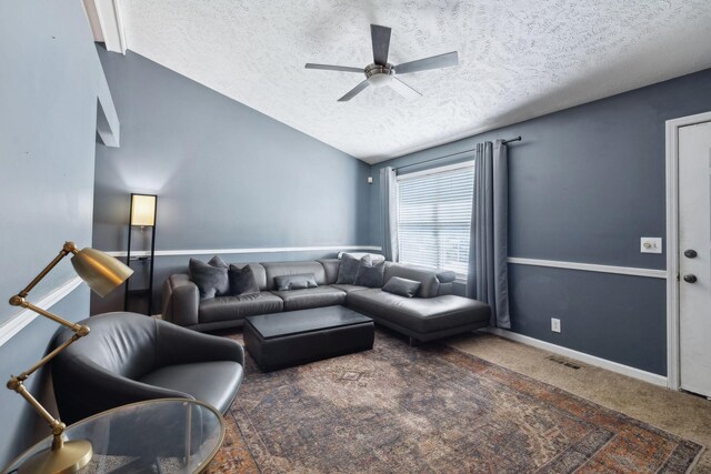 4825 Peppertree Dr, Antioch, TN 37013 - living area with carpet floors, a textured ceiling, lofted ceiling, baseboards, and ceiling fan