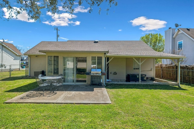 4825 Peppertree Dr, Antioch, TN 37013 - back of property with fence, a yard, and a patio area