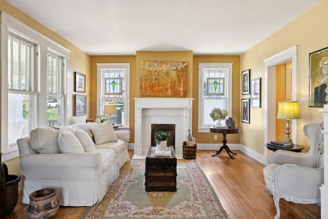 3617 Meadowbrook Ave, Nashville, TN 37205 - living room with baseboards, a brick fireplace, and wood finished floors