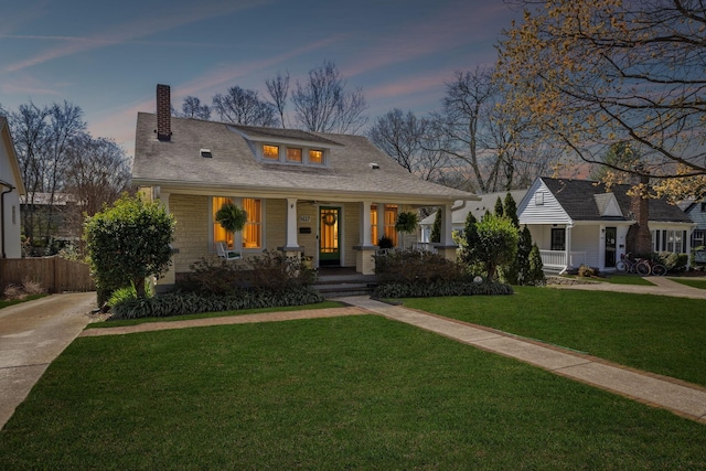 3617 Meadowbrook Ave, Nashville, TN 37205 - bungalow-style home featuring fence, a porch, a chimney, a yard, and driveway