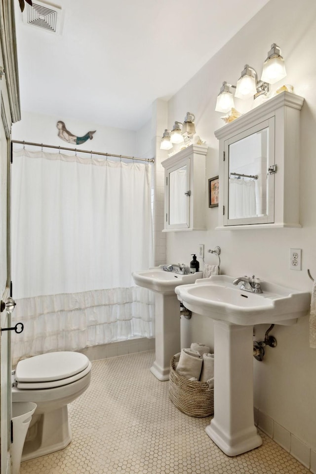 3617 Meadowbrook Ave, Nashville, TN 37205 - bathroom with visible vents, tile patterned floors, toilet, and a shower with curtain