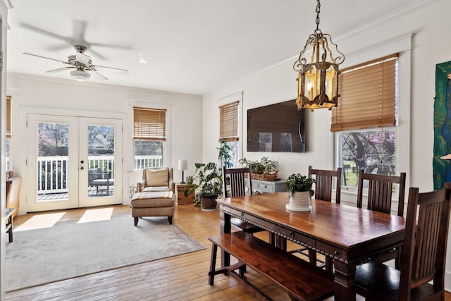 3617 Meadowbrook Ave, Nashville, TN 37205 - dining room with french doors, a wealth of natural light, ceiling fan with notable chandelier, and wood finished floors