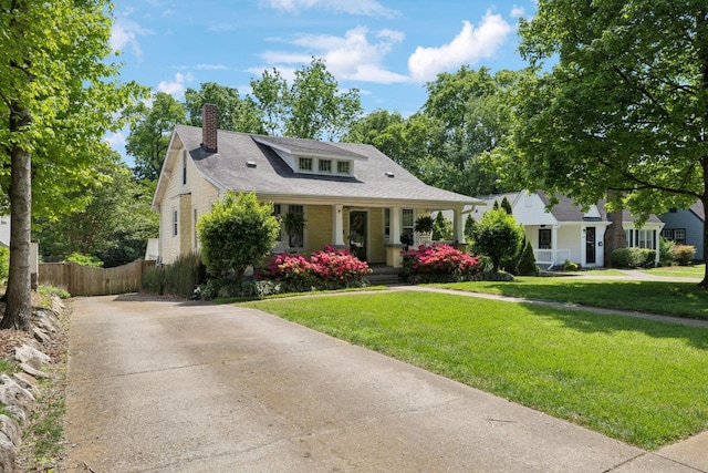 3617 Meadowbrook Ave, Nashville, TN 37205 - bungalow-style home featuring fence, a front lawn, a porch, a chimney, and driveway