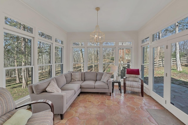1237 Temple Ridge Dr, Nashville, TN 37221 - sunroom / solarium featuring ornamental molding and a notable chandelier