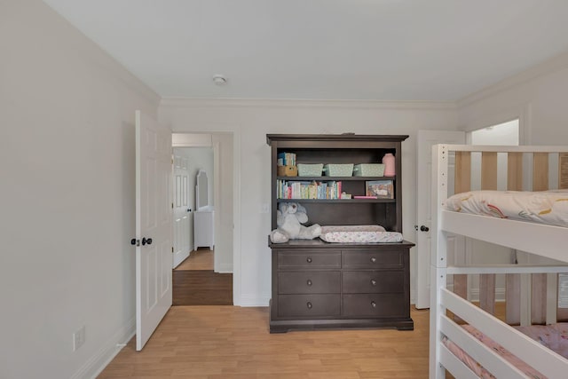 1237 Temple Ridge Dr, Nashville, TN 37221 - bedroom with ornamental molding, baseboards, and light wood-style floors