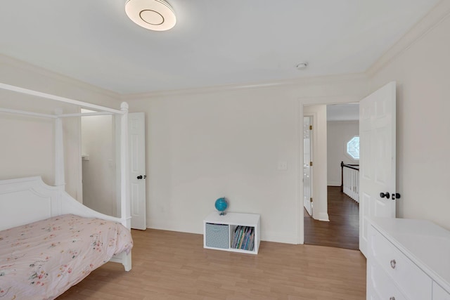 1237 Temple Ridge Dr, Nashville, TN 37221 - bedroom with light wood-style flooring, crown molding, and baseboards