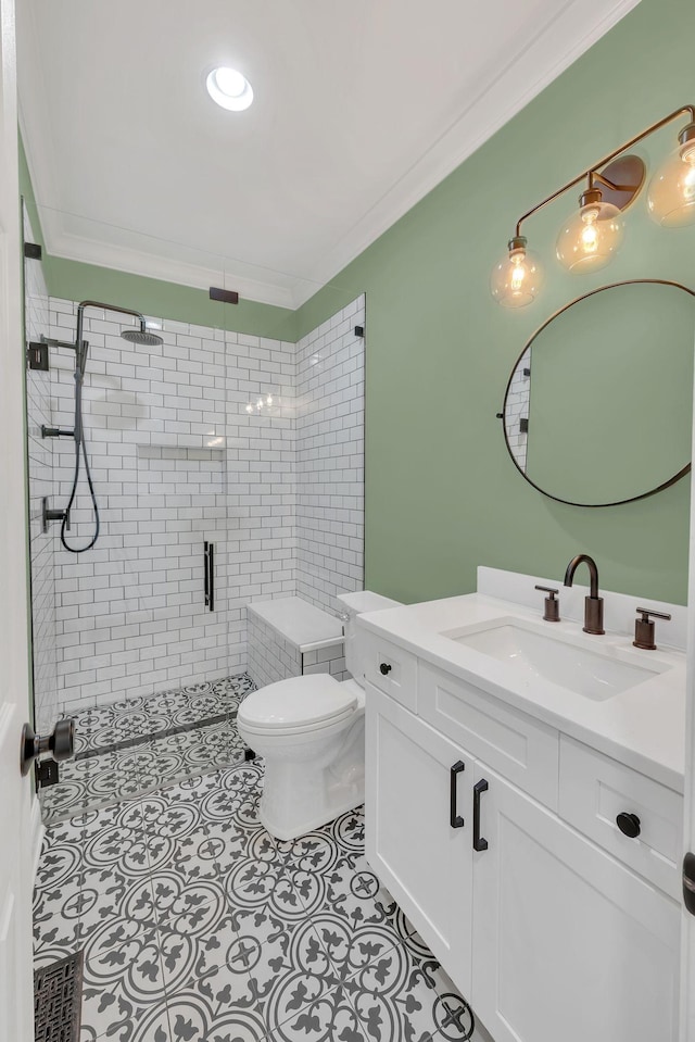 1237 Temple Ridge Dr, Nashville, TN 37221 - bathroom featuring a stall shower, toilet, vanity, tile patterned flooring, and ornamental molding