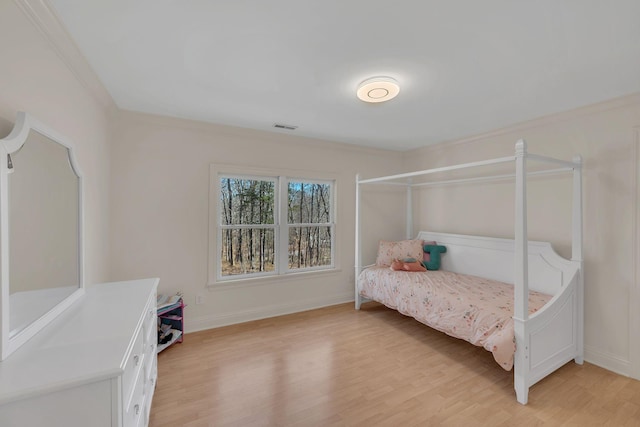 1237 Temple Ridge Dr, Nashville, TN 37221 - bedroom with crown molding, baseboards, light wood-type flooring, and visible vents
