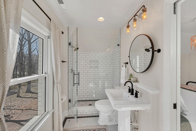 1237 Temple Ridge Dr, Nashville, TN 37221 - full bathroom with tile patterned flooring, toilet, a shower stall, a sink, and visible vents