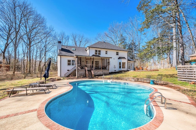 1237 Temple Ridge Dr, Nashville, TN 37221 - outdoor pool with stairs, a patio area, a deck, fence, and a sunroom
