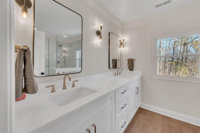 1237 Temple Ridge Dr, Nashville, TN 37221 - full bath featuring a sink, ornamental molding, a stall shower, and visible vents
