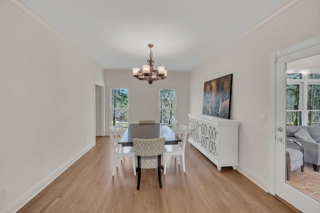 1237 Temple Ridge Dr, Nashville, TN 37221 - dining space featuring light wood finished floors, baseboards, ornamental molding, and a chandelier