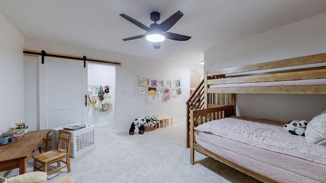 2235 Rock Springs Rd, Columbia, TN 38401 - carpeted bedroom with a barn door and a ceiling fan