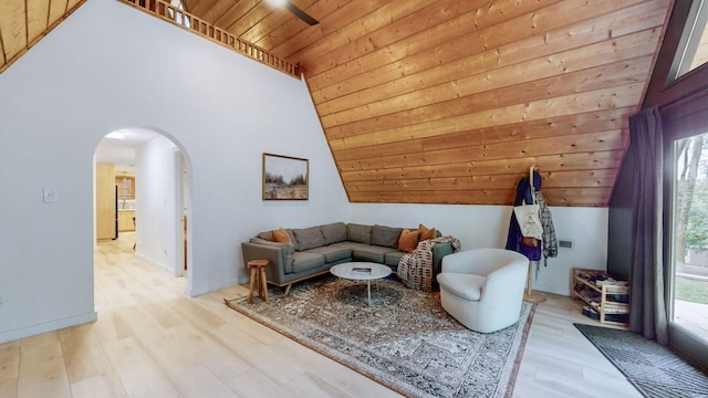 2235 Rock Springs Rd, Columbia, TN 38401 - living area with plenty of natural light, arched walkways, wooden ceiling, and light wood-style floors