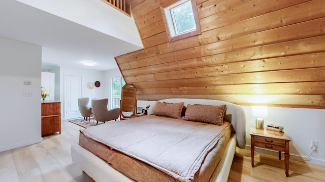 2235 Rock Springs Rd, Columbia, TN 38401 - bedroom featuring light wood-style flooring, baseboards, multiple windows, and wooden walls