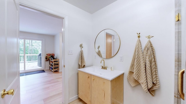 2235 Rock Springs Rd, Columbia, TN 38401 - bathroom with baseboards, wood finished floors, and vanity