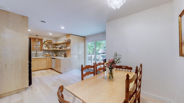 2235 Rock Springs Rd, Columbia, TN 38401 - dining area with light wood-style flooring, a notable chandelier, and recessed lighting