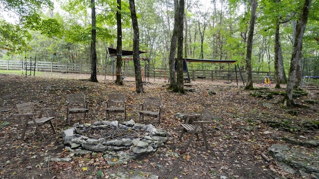 2235 Rock Springs Rd, Columbia, TN 38401 - view of yard featuring an outdoor fire pit and fence
