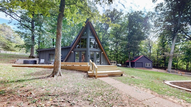 2235 Rock Springs Rd, Columbia, TN 38401 - view of front of home featuring french doors, a front yard, a wooden deck, and board and batten siding