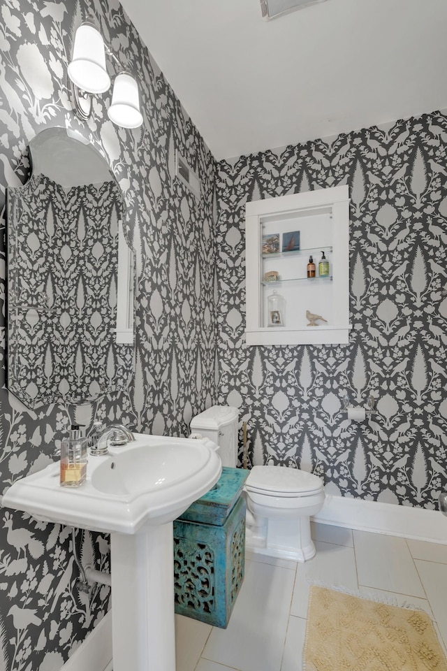 3814 Central Ave, Nashville, TN 37205 - bathroom with tile patterned floors, wallpapered walls, and toilet