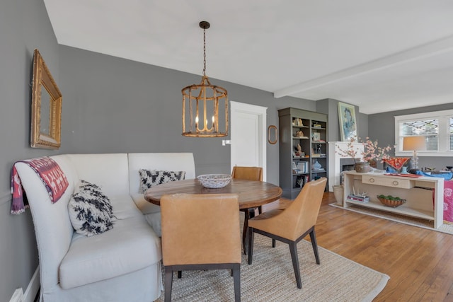3814 Central Ave, Nashville, TN 37205 - dining area with wood finished floors and an inviting chandelier