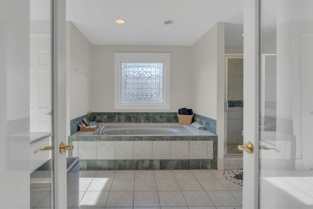 3814 Central Ave, Nashville, TN 37205 - bathroom with tile patterned flooring, a stall shower, and a garden tub