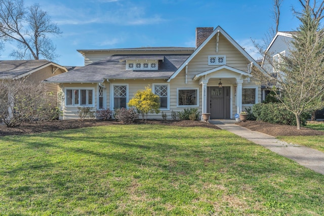 3814 Central Ave, Nashville, TN 37205 - view of front of house featuring a front yard, roof with shingles, and a chimney