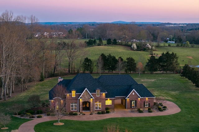 birds eye view of property featuring a rural view