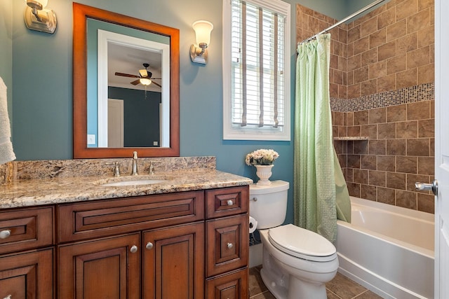 full bath with ceiling fan, toilet, vanity, shower / tub combo, and tile patterned flooring