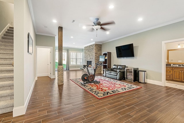 living room with baseboards, stairs, ceiling fan, and wood tiled floor
