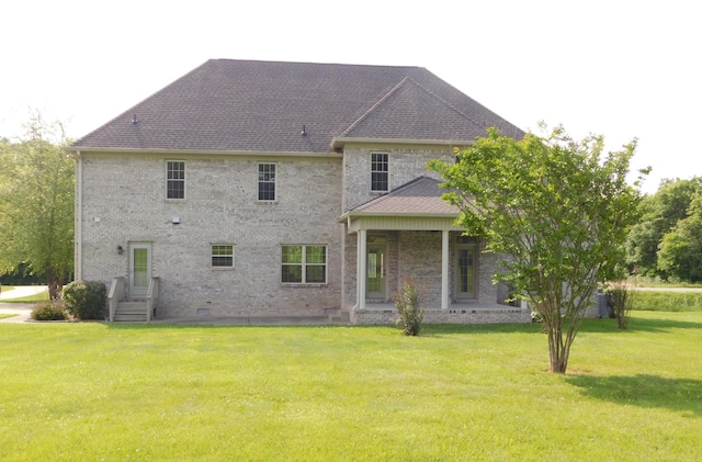 423 Carters Creek Pike, Columbia, TN 38401 - rear view of house with a yard, a shingled roof, crawl space, and brick siding