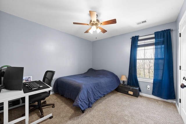 bedroom featuring carpet flooring, a ceiling fan, baseboards, and visible vents