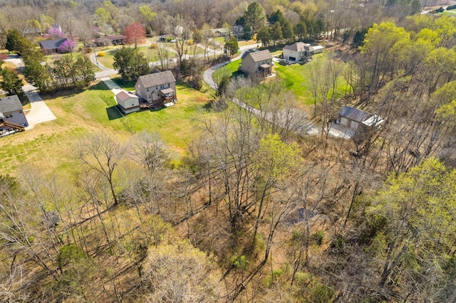 bird's eye view with a forest view