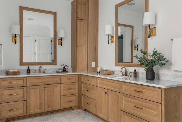 bathroom with double vanity, a sink, and ornamental molding