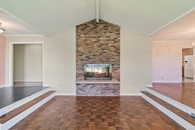 518 Wilson Pike, Brentwood, TN 37027 - unfurnished living room featuring a brick fireplace, baseboards, and vaulted ceiling with beams