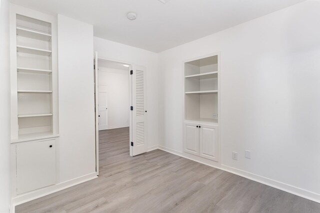 105 Leake Ave Unit 44, Nashville, TN 37205 - unfurnished bedroom with baseboards and light wood-type flooring