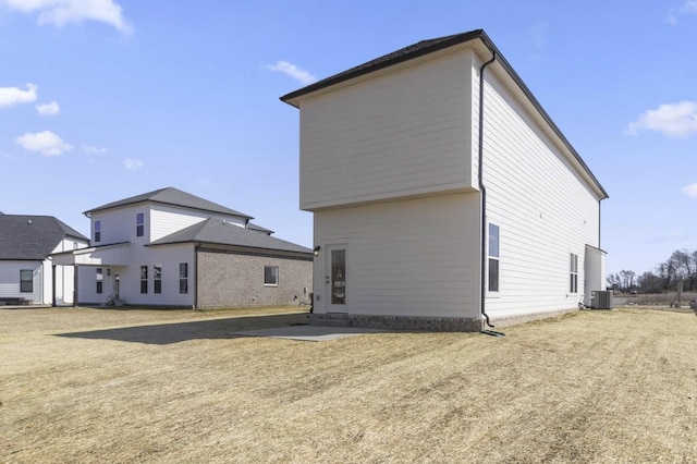 166 Oasis Dr, La Vergne, TN 37086 - back of property with central AC unit and a patio