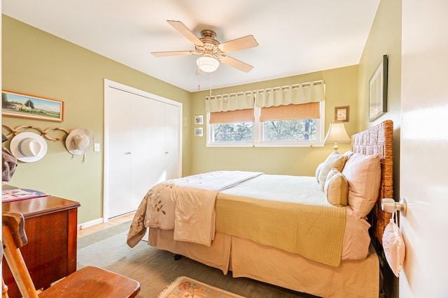 bedroom with baseboards and ceiling fan
