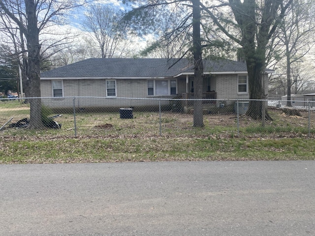 303 Randell Dr, Clarksville, TN 37042 - view of front of house with brick siding and a fenced front yard
