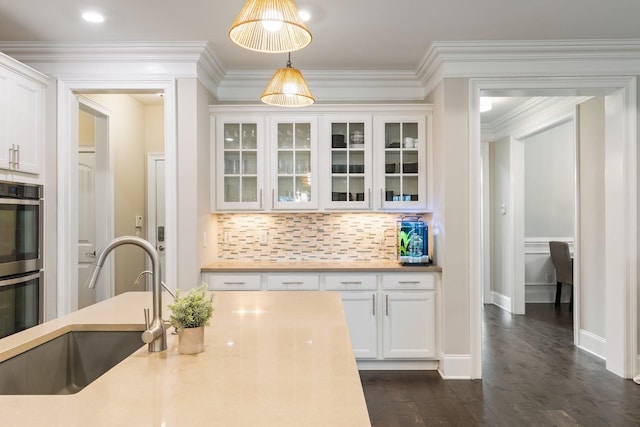 118 Newnham Bridge Dr, Nolensville, TN 37135 - kitchen featuring double oven, white cabinetry, a sink, and hanging light fixtures