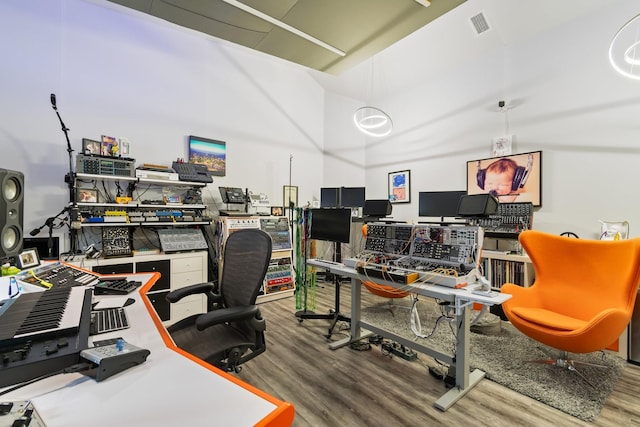 118 Newnham Bridge Dr, Nolensville, TN 37135 - office with a high ceiling, wood finished floors, and visible vents