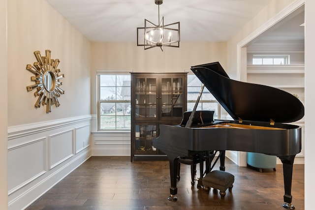 118 Newnham Bridge Dr, Nolensville, TN 37135 - sitting room featuring a notable chandelier, a wainscoted wall, and wood finished floors